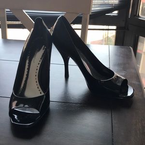 Black peep toe pumps